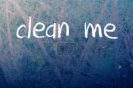 Photo for CLEAN ME wording on Abstract  dusy dirty stained  chalkboard background - Royalty Free Image