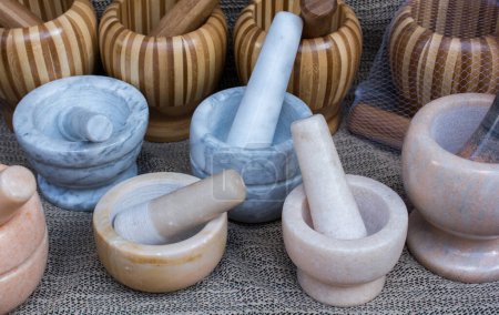 Photo for Wooden mortars and pestles as a traditional  kitchenware - Royalty Free Image