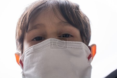 Photo for Kid wear health masks to prevent virus and germs. Disease  protection - Royalty Free Image