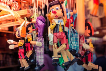 Photo for Colorful wooden pinocchio doll with his long nose - Royalty Free Image