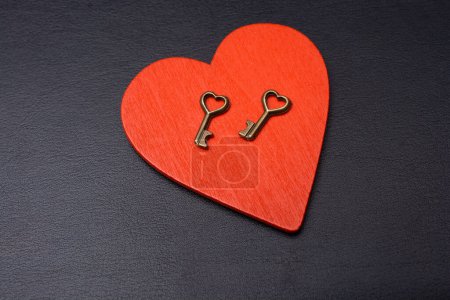 Photo for Heart shape icon and a key as love icon and romance concept - Royalty Free Image