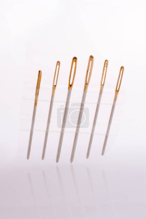 Photo for Six different sewing needles isolated on a white background - Royalty Free Image