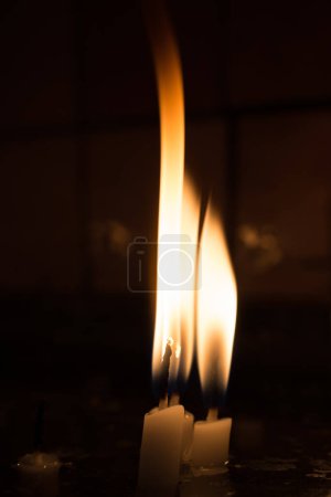 Photo for Burning candles with candle light in the dark - Royalty Free Image