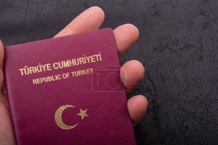 Photo for New Turkish passport. Travel, tourism, emigration and passport control concep - Royalty Free Image