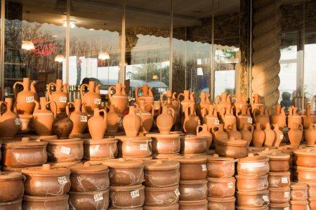Photo for Harden clay pot showing for sale in a market - Royalty Free Image
