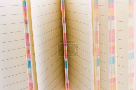 Photo for Pink notebook on a white background - Royalty Free Image