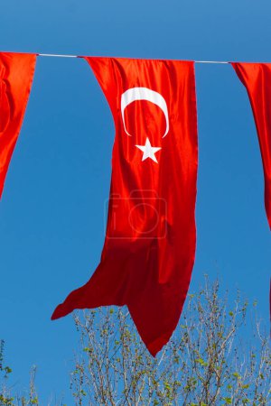 Photo for Turkish national flags hang in view in open air - Royalty Free Image