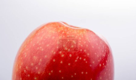 Photo for Red apple with dots in close up view - Royalty Free Image