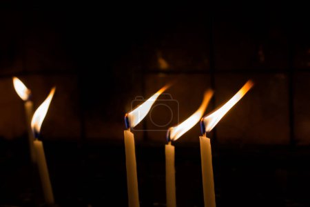Photo for Burning candles with candle light in the dark - Royalty Free Image