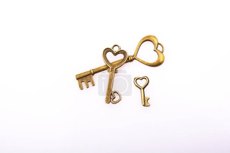 Photo for Heart shaped retro metal keys on white background - Royalty Free Image