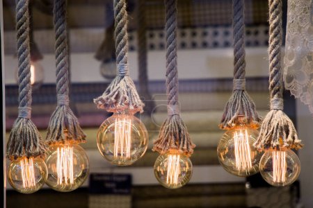Photo for Decorative antique edison style filament light bulbs hanging - Royalty Free Image