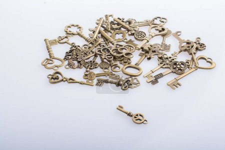 Photo for Retro style metal keys on awhite background - Royalty Free Image