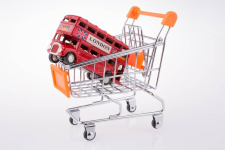 Model London Bus in a Shopping Cart