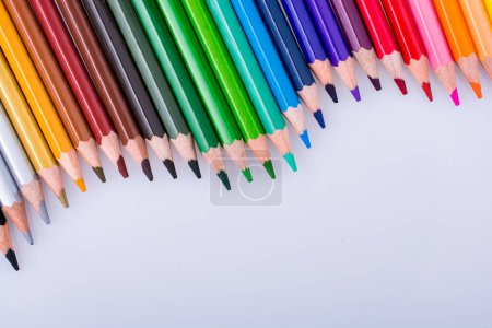 Photo for Color Pencils of Various colors placed on white background - Royalty Free Image
