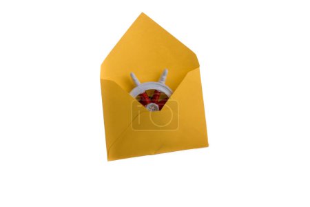 Photo for Sheeo wheel in a yellow envelope - Royalty Free Image
