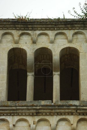 Photo for Serramonacesca - Abruzzo - Abbey of San Liberatore in Maiella - Detail of the bell tower with the openings that increase in number with height. - Royalty Free Image