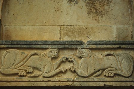 Photo for Serramonacesca - Abruzzo - Abbey of San Liberatore in Maiella - Detail of the architrave with two feline animals that collide - Royalty Free Image