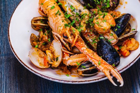 Photo for Seafood platter. Langoustine, vongole, shrimps, prawns, clams, mussels, scallop - Royalty Free Image