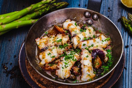 Photo for Pan-seared octopus with roasted potato - Royalty Free Image
