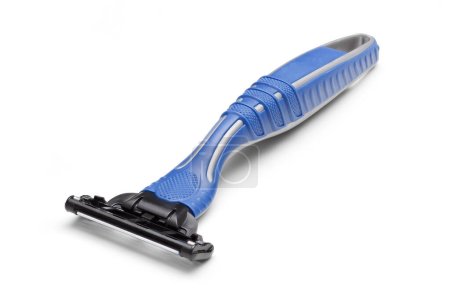 Blue razor on white with copy space