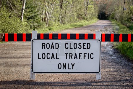 Photo for Road closed sign on rural dirt road. - Royalty Free Image