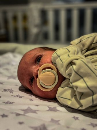 Photo for A beautiful portrait of a new born baby boy. This photo was captured only hours after being delivered by a Caesarean Section in hospital. - Royalty Free Image