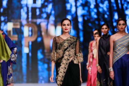 Photo for Models on the runway showcasing "Sanam C's collection" at Fashion Pakistan Week Winter Festive 21-22. Fashion week in Karachi 14th October 2021 - Royalty Free Image