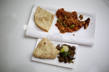 Photo for Indian Pakistani Cuisine. Desi Paratha Platter - Royalty Free Image