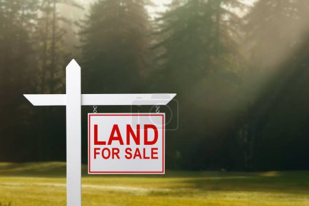 Photo for Conceptual sign against beautiful landscape with text - LAND FOR SALE - Royalty Free Image