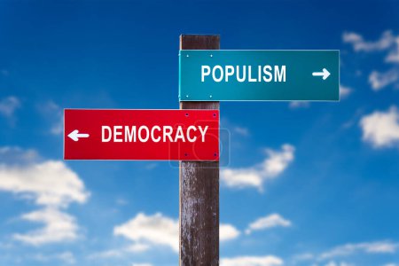 Téléchargez les photos : Populisme contre démocratie - Panneau routier avec deux options - en image libre de droit