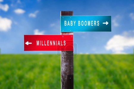 Téléchargez les photos : Baby Boomers vs Millennials - Panneau de signalisation avec deux options - en image libre de droit