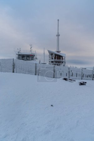 Lysa hora hill summit with communication tower in winter Moravskoslezske Beskydy mountains in Czech republic