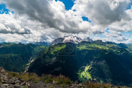 Marmolada and few other peaks from Monte Sief hill summit in the Dolomites during beautiful summer day