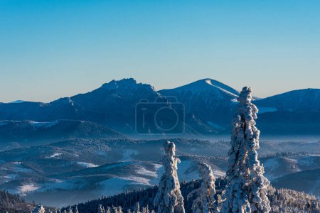 Velky Rozsutec and Stoh in Mala Fatra mountains from Velka Raca hill in winter Kysucke Beskydy mountains on slovakian - polish borders