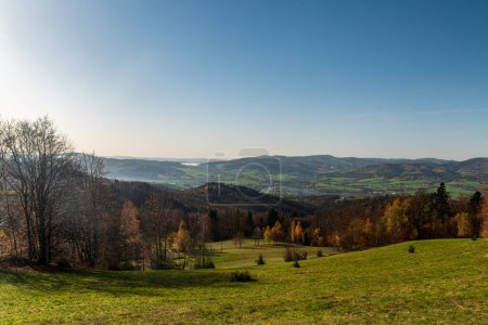 Beautiful morning view from meadow bellow Filipka hill summit in autumn Slezske Beskydy mountains in Czech republic