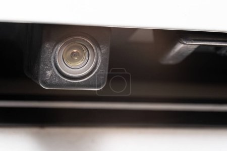 Photo for Rear view camera close up for parking assistance. Concept of safety car driving while parking process. Assist device equipment in modern cars. Small camera attached to car - Royalty Free Image