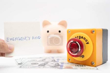 Concept of emergency savings fund. A piggy bank with dollar and stop button. money with piggy bank for saving emergency money. 