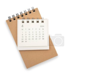 Einfacher Tischkalender für APRIL 2024 und leere Notiz isoliert auf weißem Hintergrund. Kalenderkonzept mit Kopierraum.
