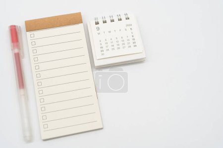 Blank Check list or Empty small notepad with checkbox and Simple desk calendar for SEPTEMBER 2024. Blank checklist for text. Copy Space.