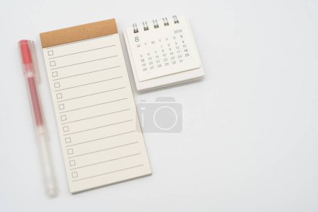 Blank Check list or Empty small notepad with checkbox and Simple desk calendar for AUGUST 2024. Blank checklist for text. Copy Space.