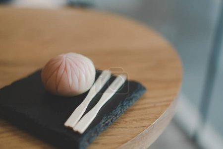Nerikiri Wagashi Japanese Sweet on wooden table. japanese small pretty sweets colorful.