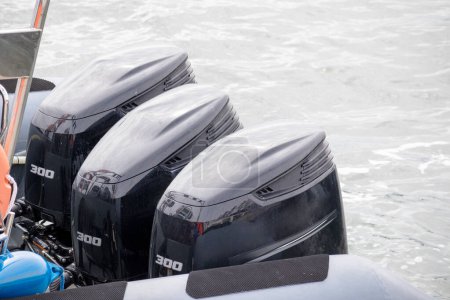 Photo for Lifeboat with three black motors on it - Royalty Free Image