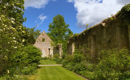 Photo for The ruins of Tithe Barn are located in the grounds of Sudeley Castle in Gloucestershire, England - Royalty Free Image