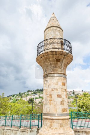 Photo for Old abandoned minaret in a public park on Jabotinsky street in the old part of Safed city in northern Israel - Royalty Free Image