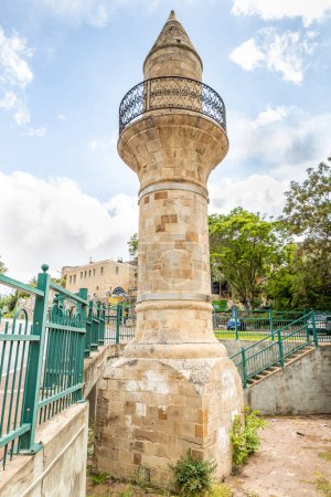 Photo for Old abandoned minaret in a public park on Jabotinsky street in the old part of Safed city in northern Israel - Royalty Free Image