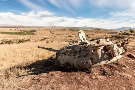 Photo for Turret of the Israeli tank destroyed during Yom Kippur War is located in Valley of Tears near OZ 77 Tank Brigade Memorial on the Golan Heights in northern Israel - Royalty Free Image