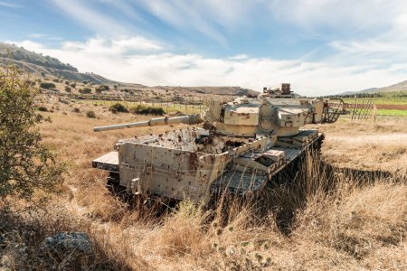 Photo for An Israeli tank destroyed during the Yom Kippur War remains in the Valley of Tears near the OZ 77 Tank Brigade Memorial on the Golan Heights in northern Israel - Royalty Free Image