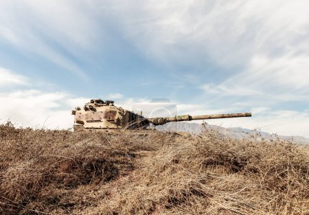 Israeli tank with turret facing Syria destroyed during Yom Kippur War is located in Valley of Tears near OZ 77 Tank Brigade Memorial on Golan Heights in northern Israel