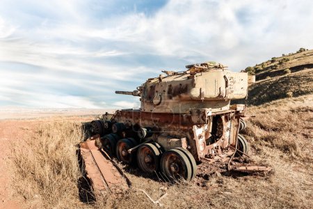 Photo for The remains of Israeli tank destroyed during Yom Kippur War in Valley of Tears near OZ 77 Tank Brigade Memorial on the Golan Heights in northern Israel - Royalty Free Image