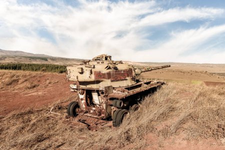 Photo for The remains of the Israeli tank destroyed during the Yom Kippur War in Valley of Tears near OZ 77 Tank Brigade Memorial on Golan Heights in northern Israel - Royalty Free Image